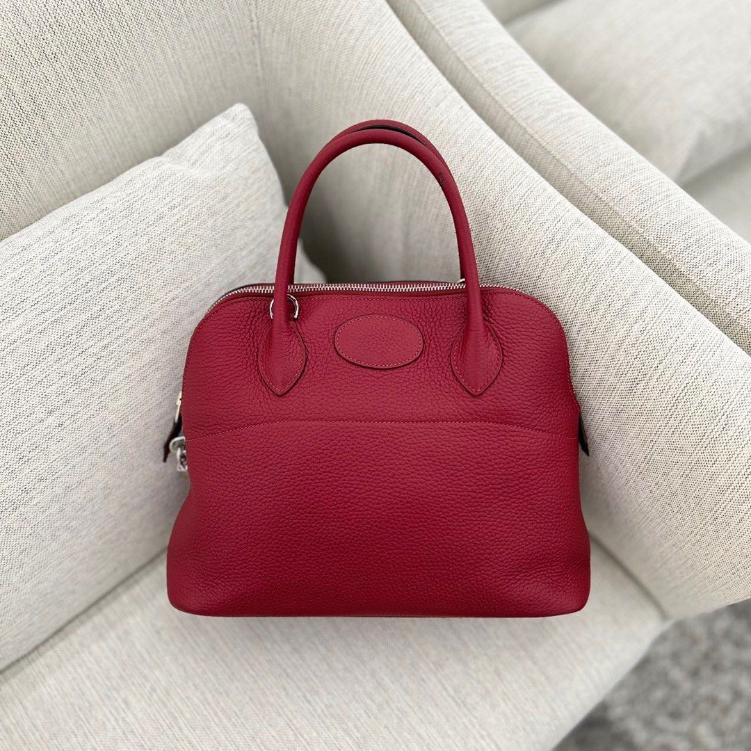 Sold at Auction: Hermes Rouge Grenat Clemence Bolide 31
