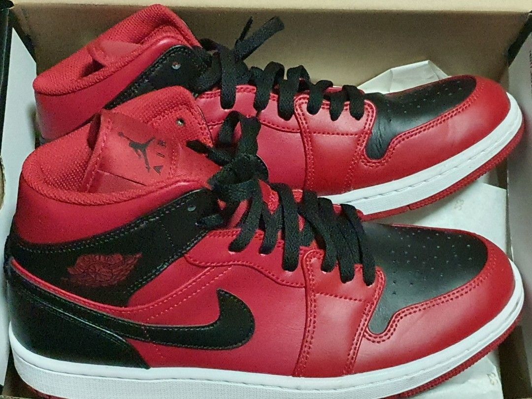 Red and black outlet jordan 1 mid