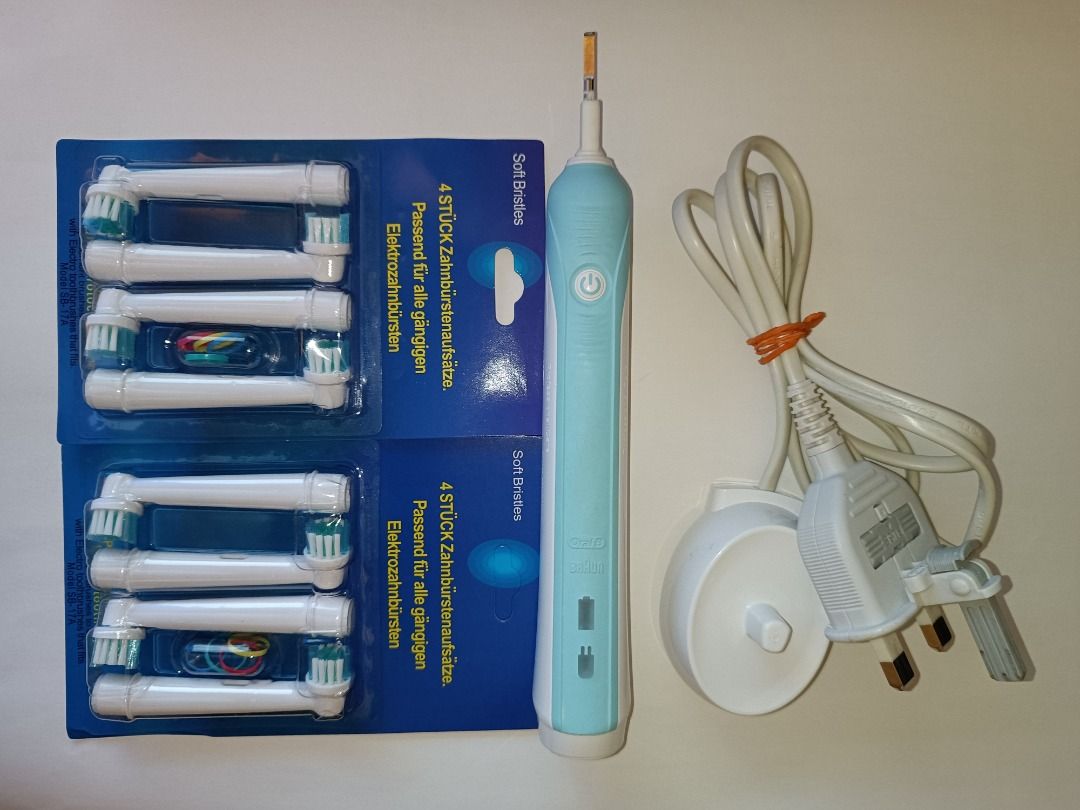 OralB Braun Electric toothbrush + 8 brush heads, Beauty & Personal