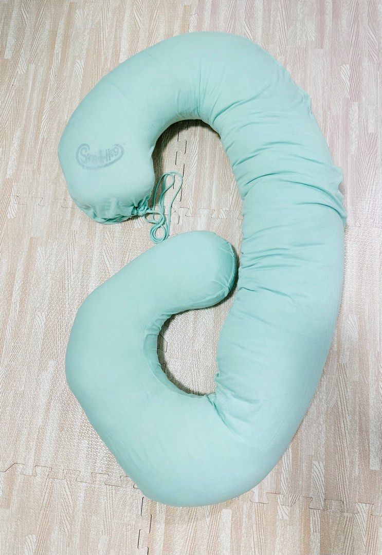 Snug-a-hug maternity and nursing pillow (Category: Maternity Care) located in Malolos. Submitted by aie.o (Listing ID 1214960959, Image 2). Description: Original snug-a-hug value at 2,500 Complete with pillow case and plastic container Very useful starting from pregnancy, breastfeeding, or normal pillow at night Can be shipped from Malolos or Manila.