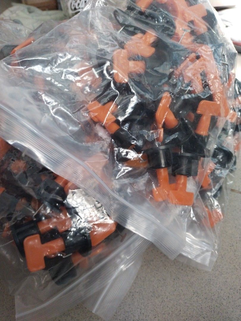 Tile levelling set 50pcs (brand new) (Category: Construction & Building Materials) located in Quezon City. Submitted by dcmarvels (Listing ID 1215024130, Image 3). Description: Tile levellig system to remove lippage / unevenness during laying of tiles in both floor and wall. Guarantess flatness of the tiled surface. Also helps in avoiding movement of tiles during mortar / adhesive setting. Clips and Wedges made with high quality PP material. Plie