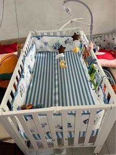 Adjustable crib & mattress bundle (inclusive of musical hanging toy, 1 set of disney comforter and sheet)