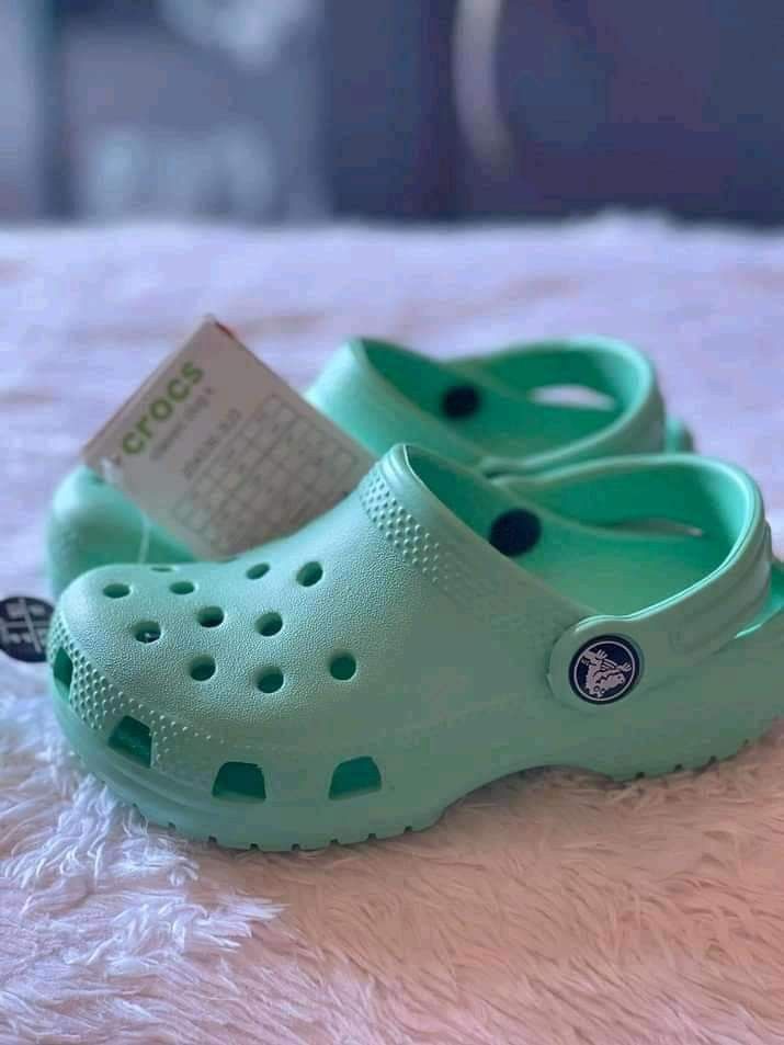 neo mint crocs size 9
