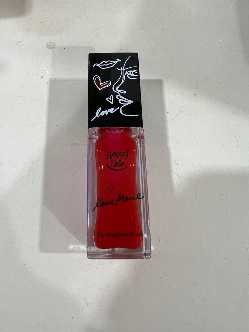 Happy Skin Lip Treatment Oil in Rose on Carousell