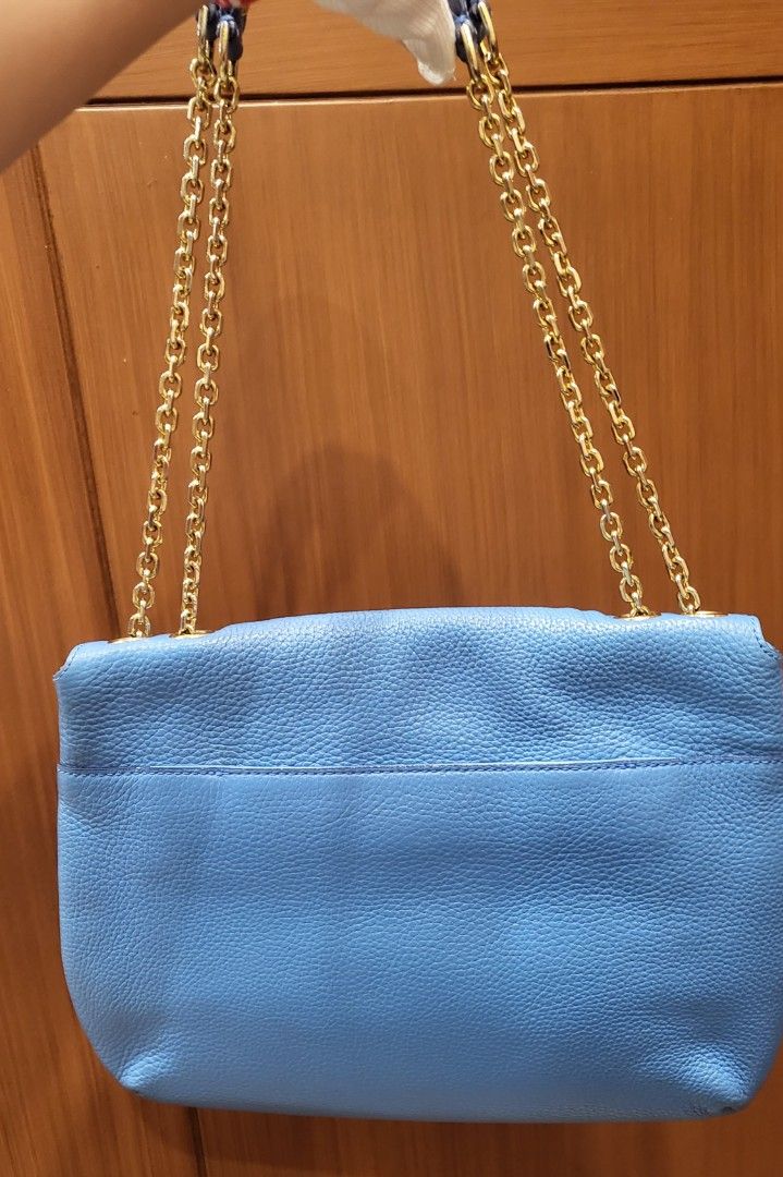Original MCM Leather Chain Flap Bag (Category: Luxury Bags & Wallets) located in Quezon City. Submitted by cglui_152 (Listing ID 1215209760, Image 2). Description: Pre-owned, guaranteed original MCM adjustable chain strap, minimal rubs on corners, refer to the photo for the actual condition of the bag No inclusion.