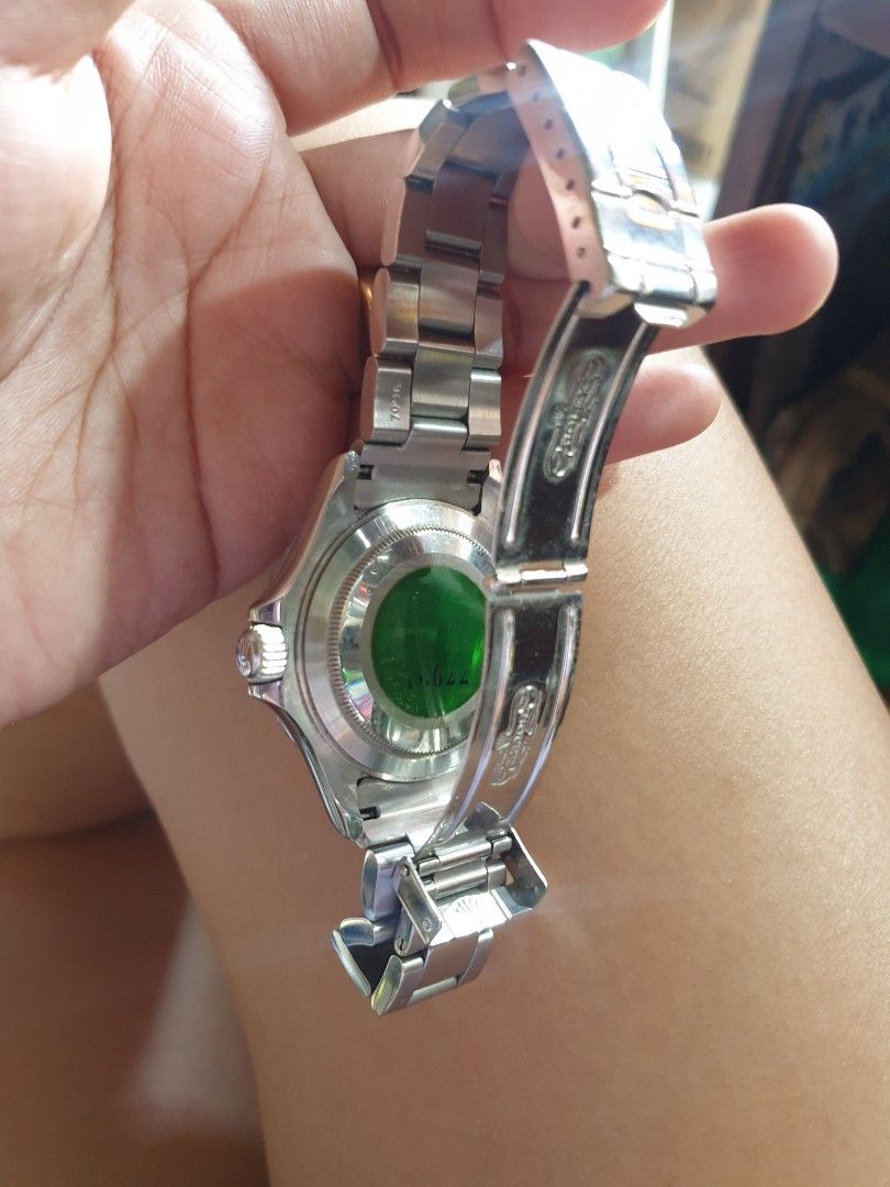 2004 Rolex Yacht-Master 34mm Japan Class A (Category: Luxury Watches) located in Pasay City. Submitted by preluv_mari (Listing ID 1215337749, Image 3). Description: pre-owned from japan Flaw: medyo may moist, sign of used circa 2004 34mm silver-tone platinum round face geometric dial signature Mercedes hands magnified date window signature Cyclops lens rotating bezel screw-down crown signature Oyster Perpetual bracelet folding clasp automatic mov