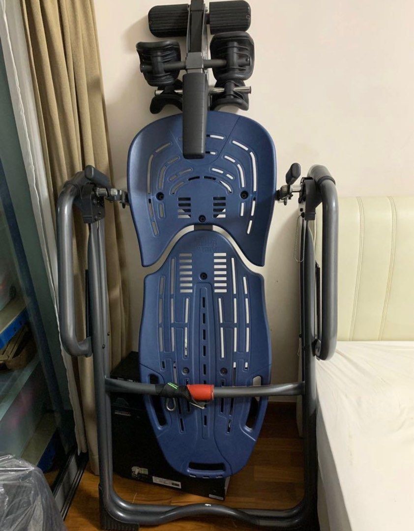 Teeter back clearance stretch machine