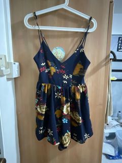 Floral romper with criss cross back