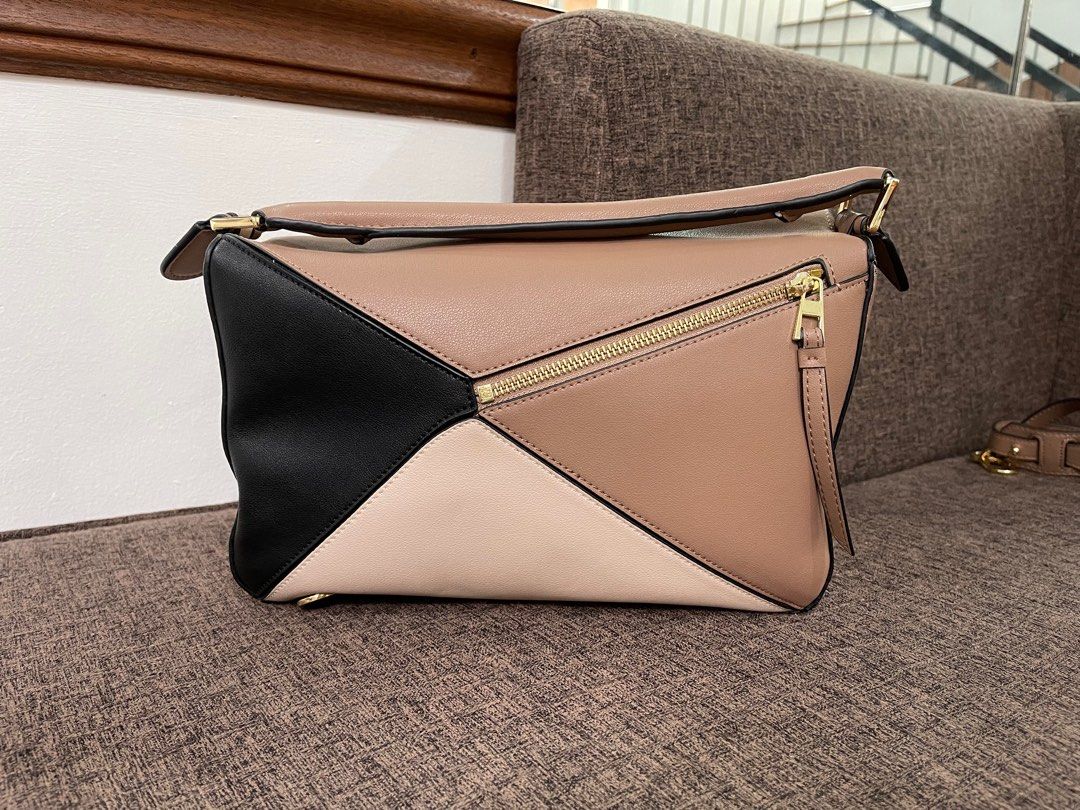 Loewe TriColor Bag (Category: Cross-body Bags) located in Paranaque City. Submitted by epione_bags (Listing ID 1215332612, Image 3). Description: Loewe Puzzle Bag Tricolor Like new guaranteed genuine leather auth not guaranteed super gandaaaaaaaa Japan sourced Pls. read before inquiring: ‼️No resellers price - items are sold and priced per piece. Hindi po ako supplier ‼️All items are sourced from Japan and Korea ‼️Client will pay for shipping fee