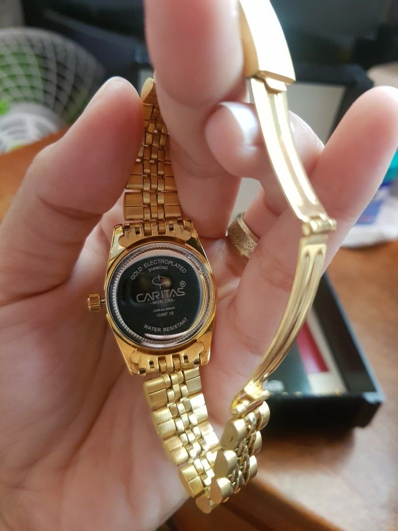 Caritas couple watch shop
