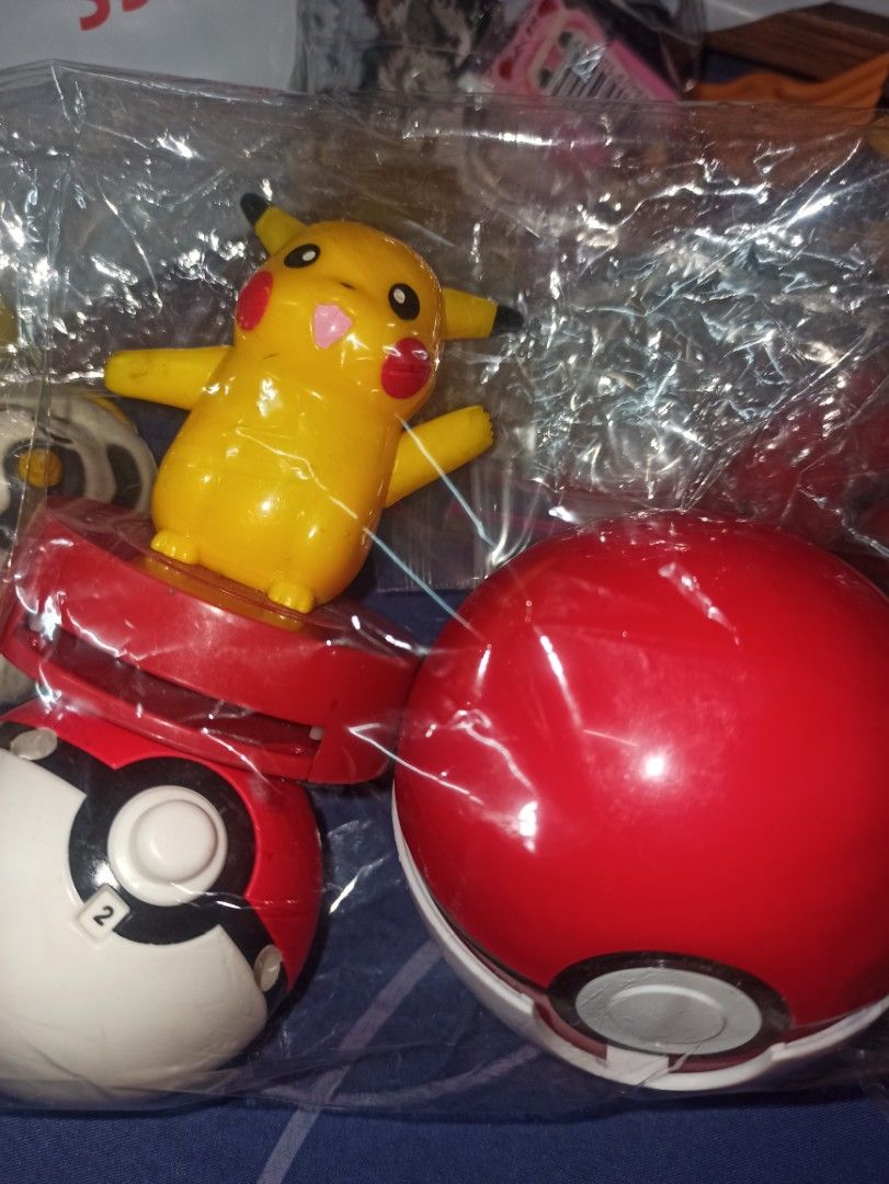 Pikachu+2pcs pokeballs set on Carousell