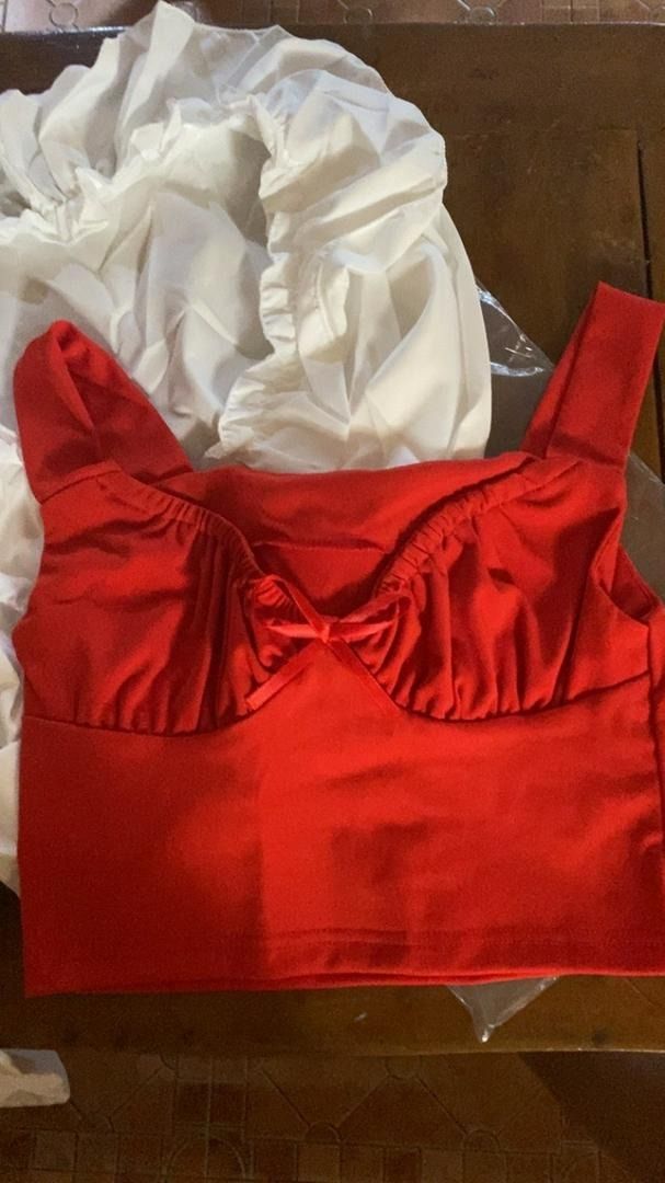 Red bustier top (Category: Sleeveless) located in Caloocan City. Submitted by ish.declutters (Listing ID 1215387968, Image 1). Description: Mod: shopee check out/lalamove Mop: gcash.