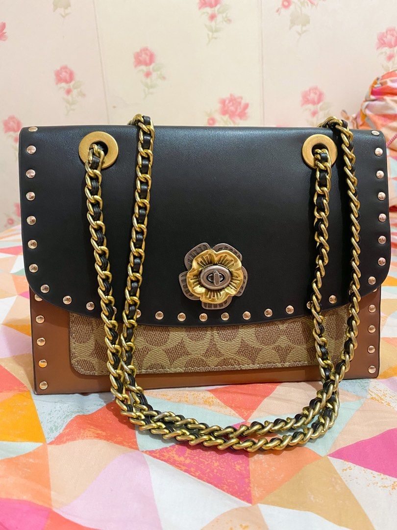 Harga coach parker store