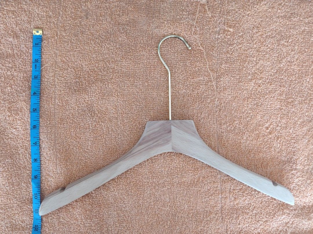 Wood hanger gold hook on Carousell