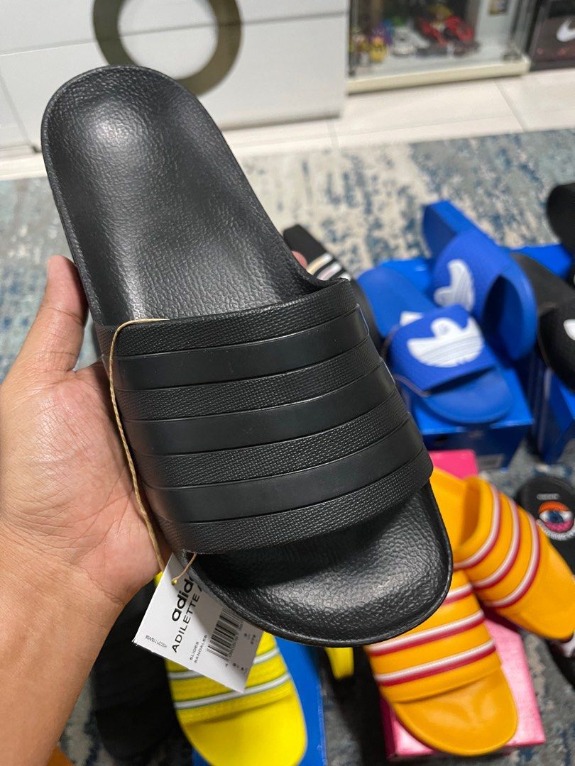 Adilette aqua slides, Men's Fashion, Footwear, Flipflops and Slides on  Carousell