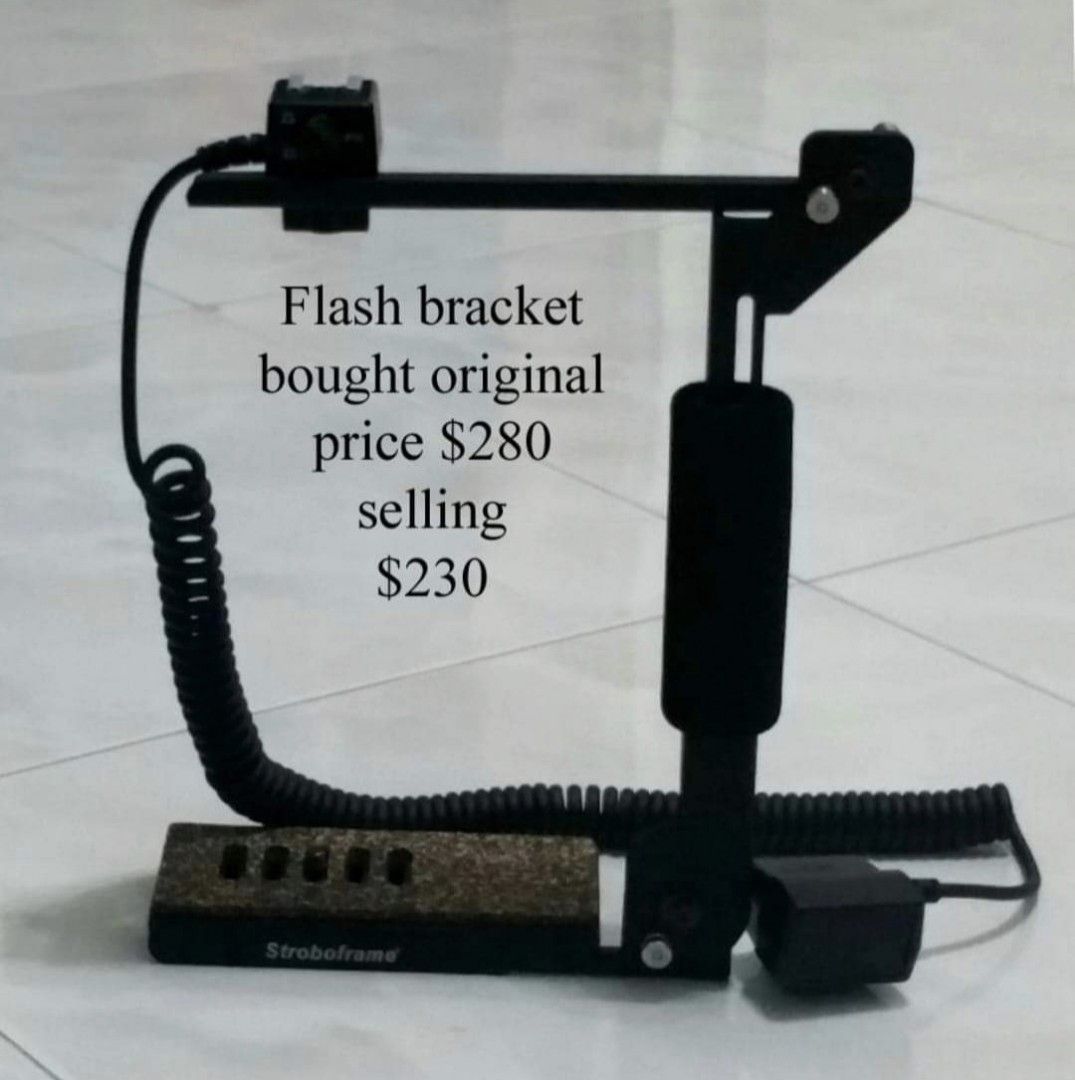Flash bracket (Category: Cameras) located in Singapore. Submitted by finbmh (Listing ID 1215510619, Image 1). Description: selling my flash bracket only use for 2 time and always keep in my cabinet .. reason for sell never use always keepin cabinet.