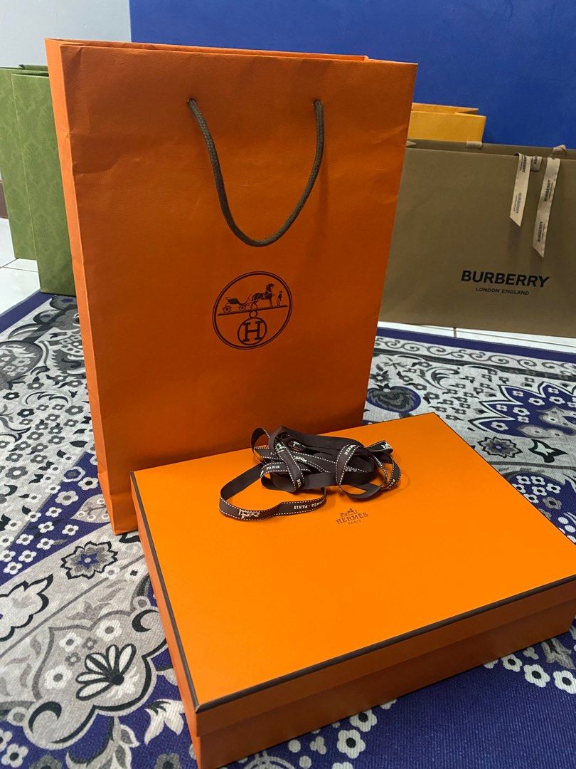 Hermes Box paper bag with ribbon. Luxury Bags Wallets on