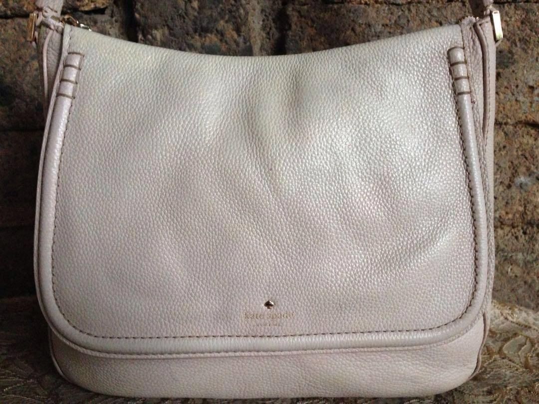 Original Kate Spade Shoulder Bag (Category: Shoulder Bags) located in Marikina City. Submitted by arrveefm (Listing ID 1215515762, Image 3). Description: Selling at Php 1,500.00 (Shipping NOT YET Included) FIXED PRICE!!! We do not entertain hagglers. -- In tagalog bawal "TUMAWAD". If you are too fancy or very attentive to detail (in other words "MAARTE"), this bag is NOT for you (refer to last picture). "Never expect flawless quality from Used/Pr