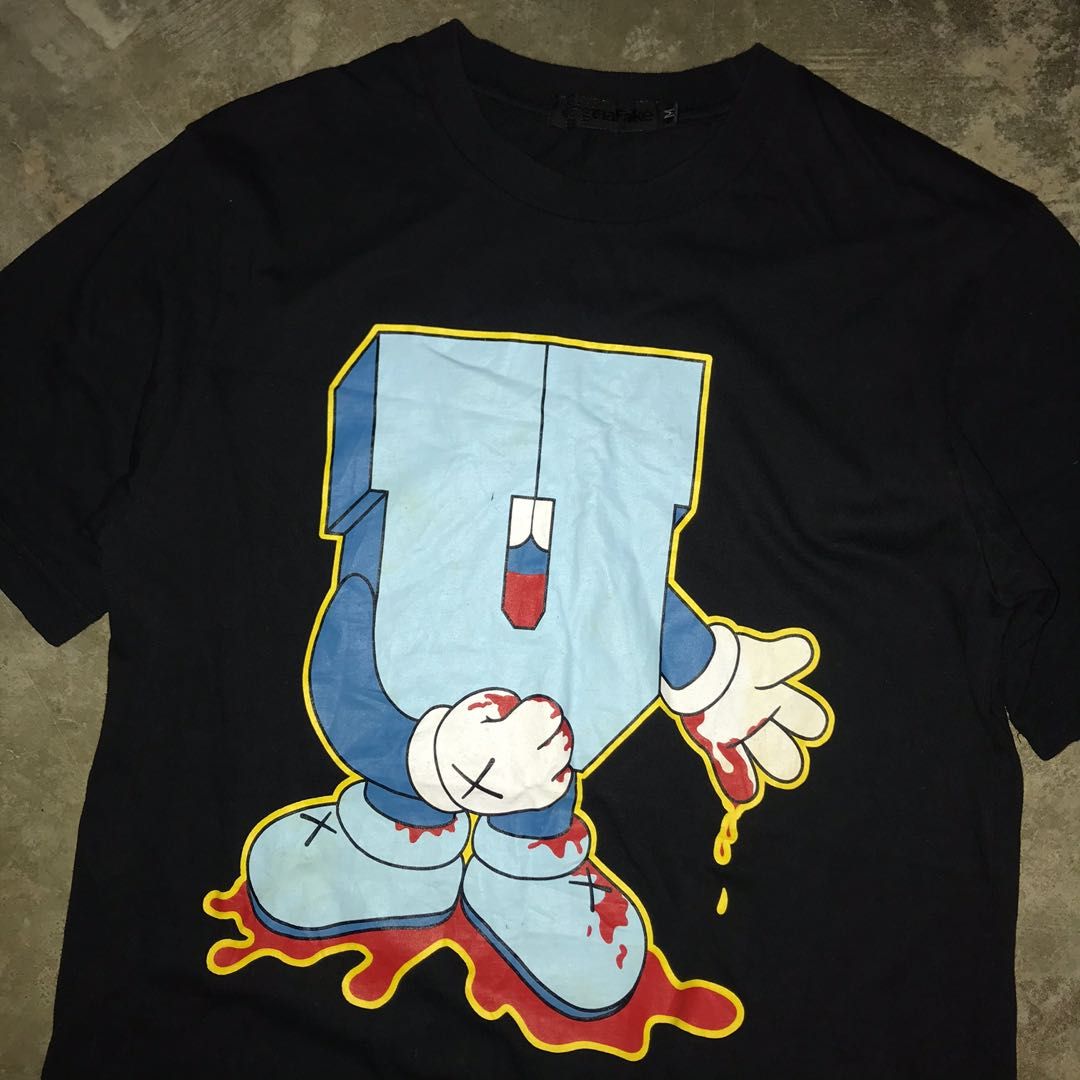 UNDEFEATED x KAWS OriginalFake Tシャツ-