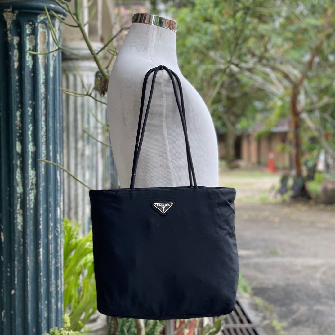 Prada nylon bucket bag SALE, Luxury, Bags & Wallets on Carousell