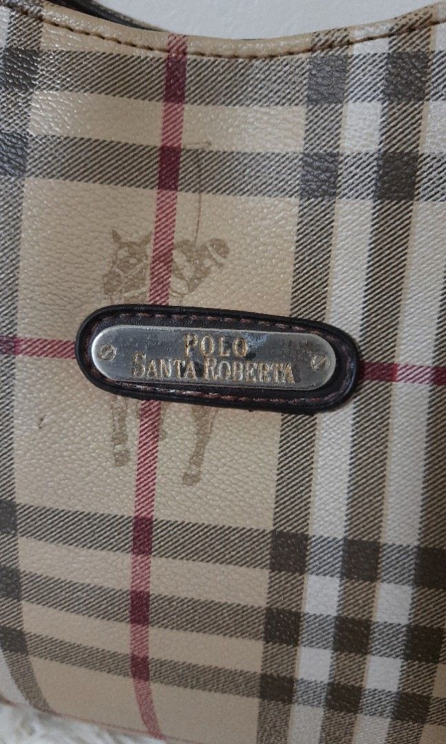 💕Preloved POLO Santa Roberta Shoulder bag (Category: Luxury Bags & Wallets) located in Santa Rosa. Submitted by Zophahollic (Listing ID 1215678268, Image 2). Description: ✅️ Very nice in actual,.like burbery😃 ✅️ PvC material ✅️ Medium size, zipper closure long handle shoulder bag ✅️ with flaws, few lines on the side, holes on thw bottom,little penmark near the plate.