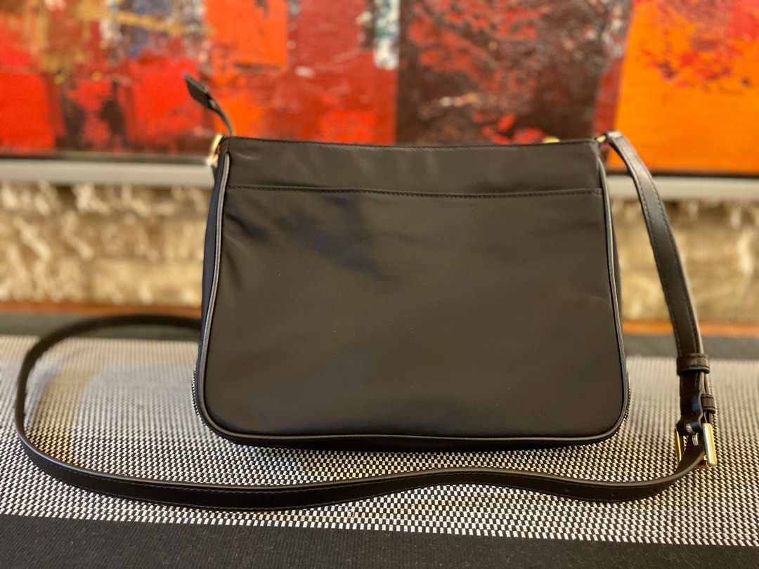 Tory burch fleming swingpack black hot sale
