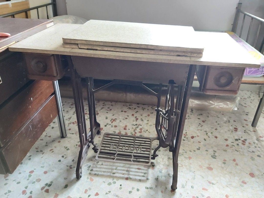 Premium Photo | A vintage sewing machine on a wooden table Vintage sewing machine with table