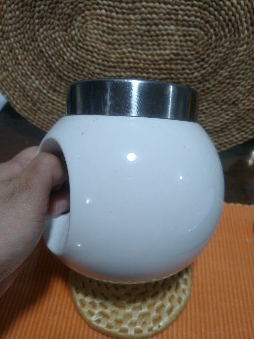 White Ceramic Ball shape Canister (Category: Food Organization & Storage) located in Cavite. Submitted by wishie_collects (Listing ID 1215611134, Image 1). Description: super nice white canister airtight lid sugar/milk canister.