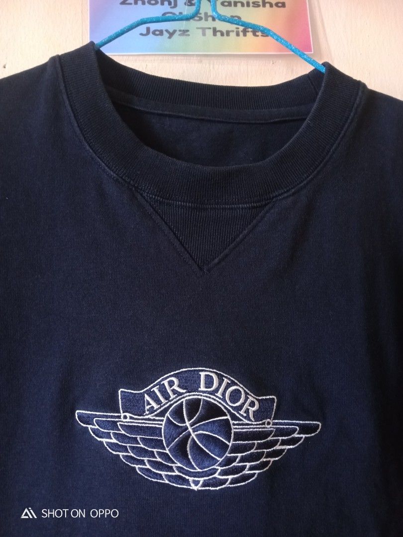 travis dior collab