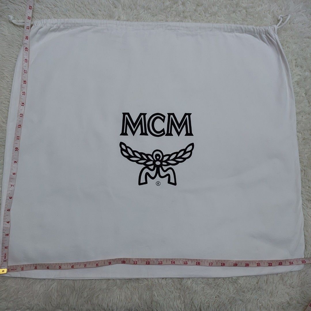 Authentic MCM dust bag 22x25 inches (Category: Luxury Bags & Wallets) located in Manila. Submitted by jfluxury.co (Listing ID 1215829294, Image 2). Description: excellent condition no flaws bought in Japan 🇯🇵 💯% Authentic. 😊 Money back guarantee. 😊 Clean and ready to use na po..