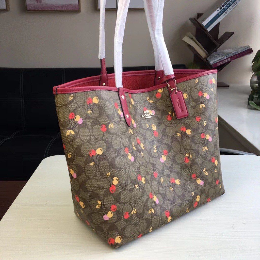 Reversible city tote in signature 2025 canvas