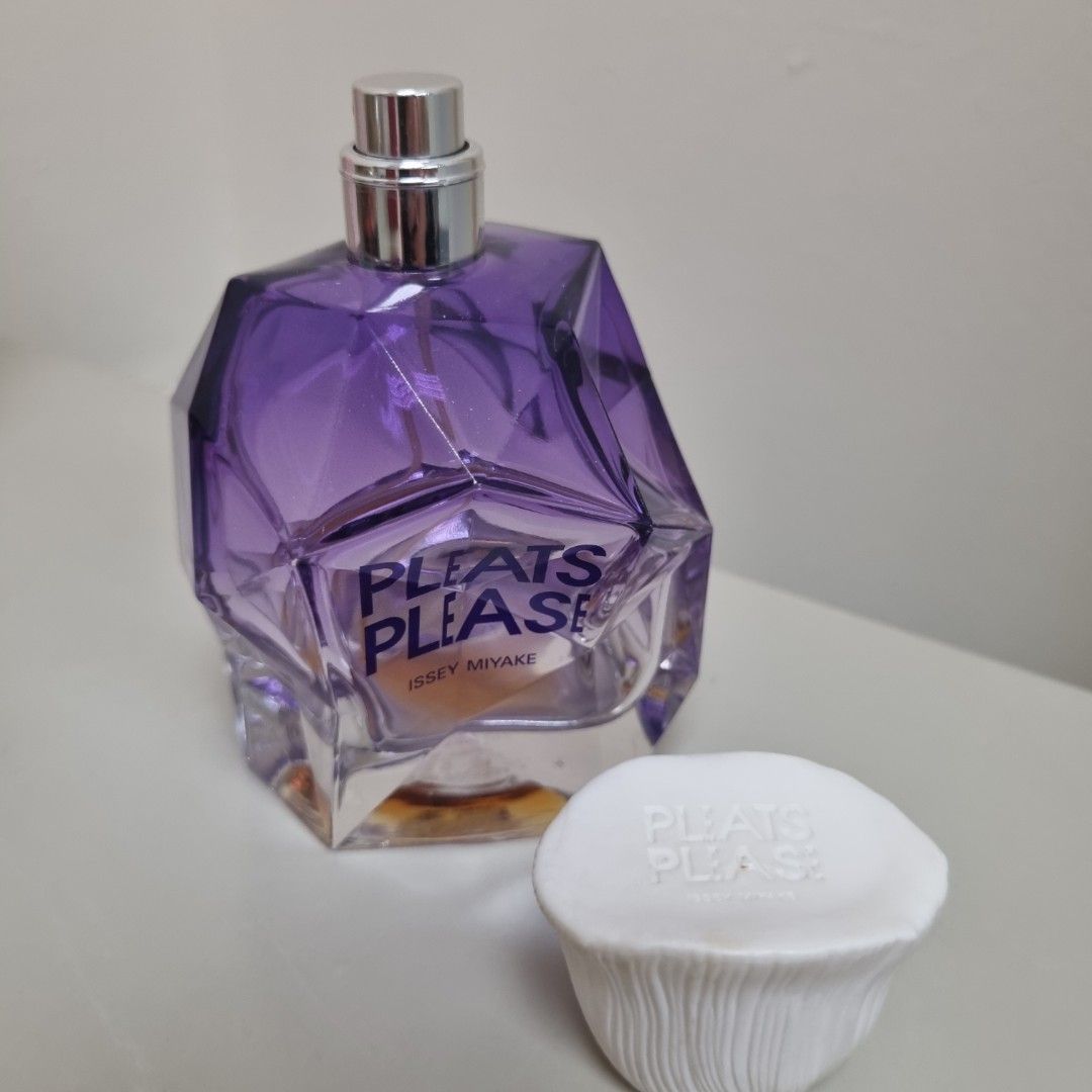 Empty Issey Miyake Pleats Please 100ml EDP perfume bottle