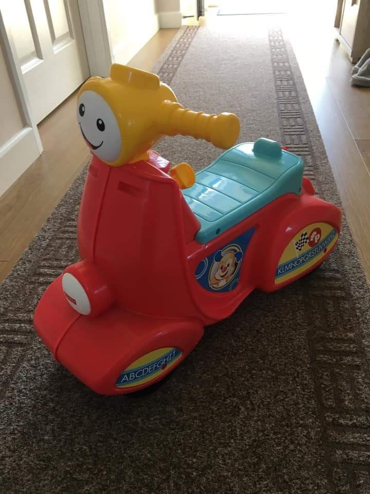 Fisher price smart shop stages ride on