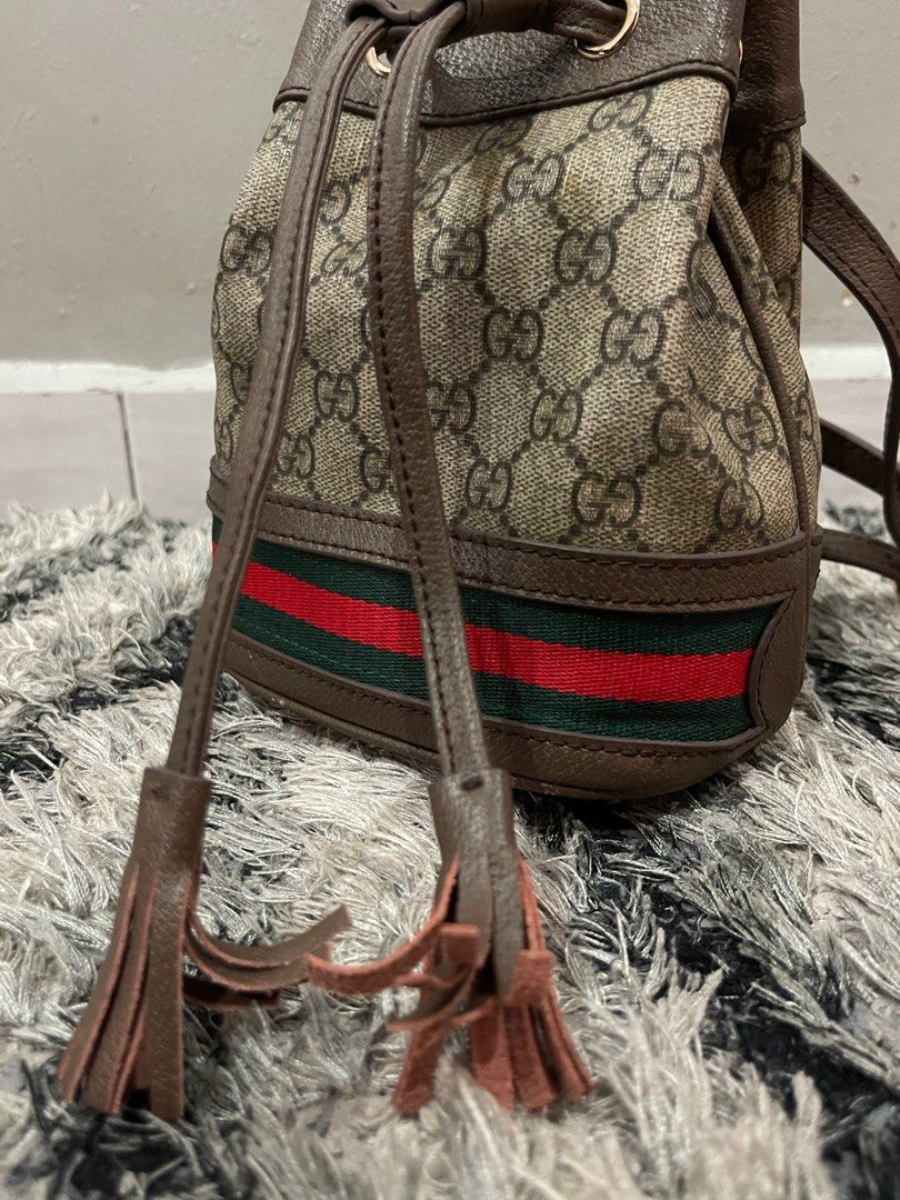 Gucci supreme store bucket bag