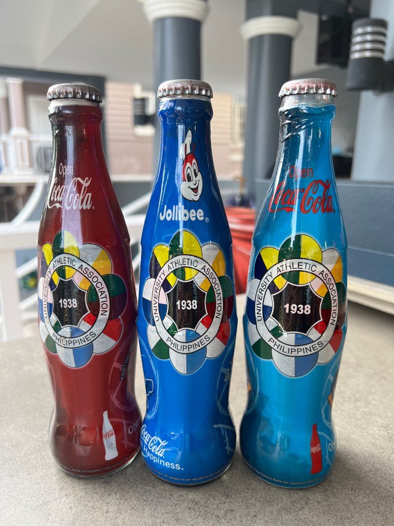 Jollibee x CocaCola Coke UAAP Wrapped Bottles on Carousell