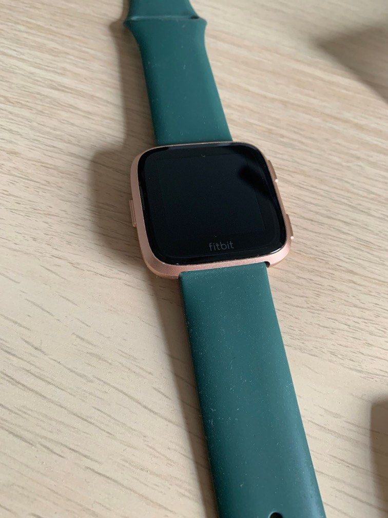 Lightly used Fitbit Versa Lite with free straps