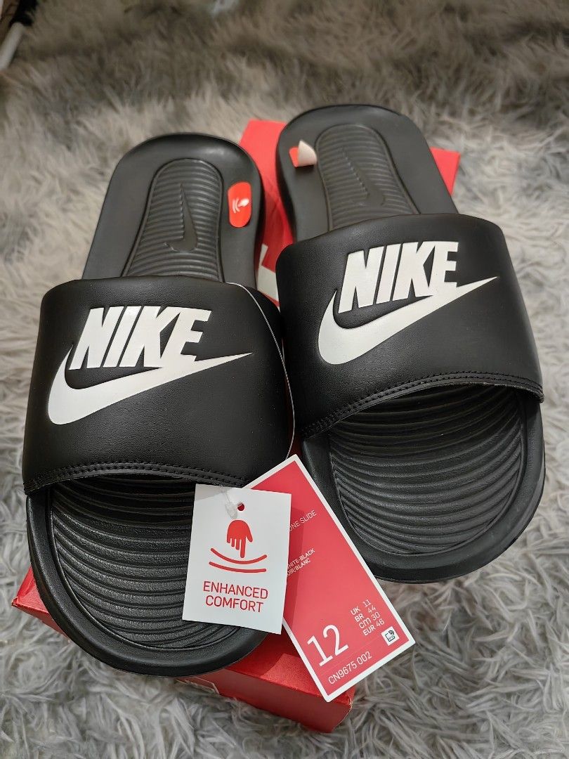 Nike slippers store below 500