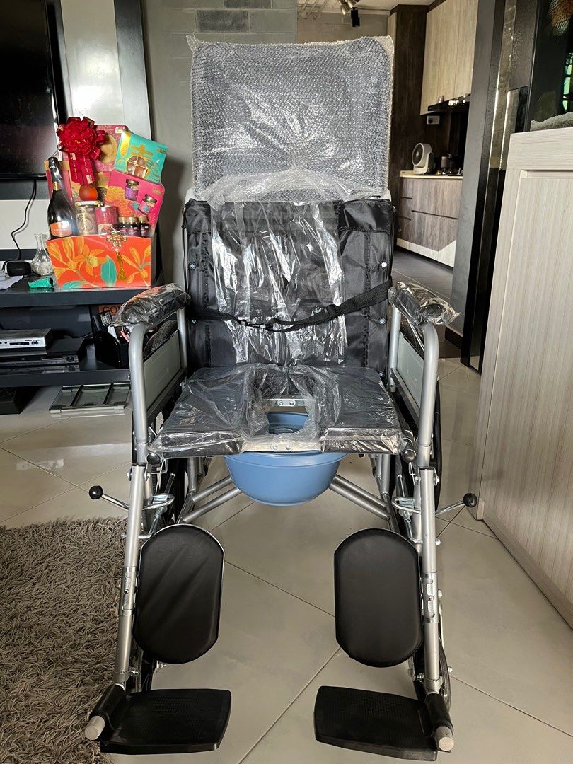 Recline Wheelchair with leg elevate and removable potty and free table