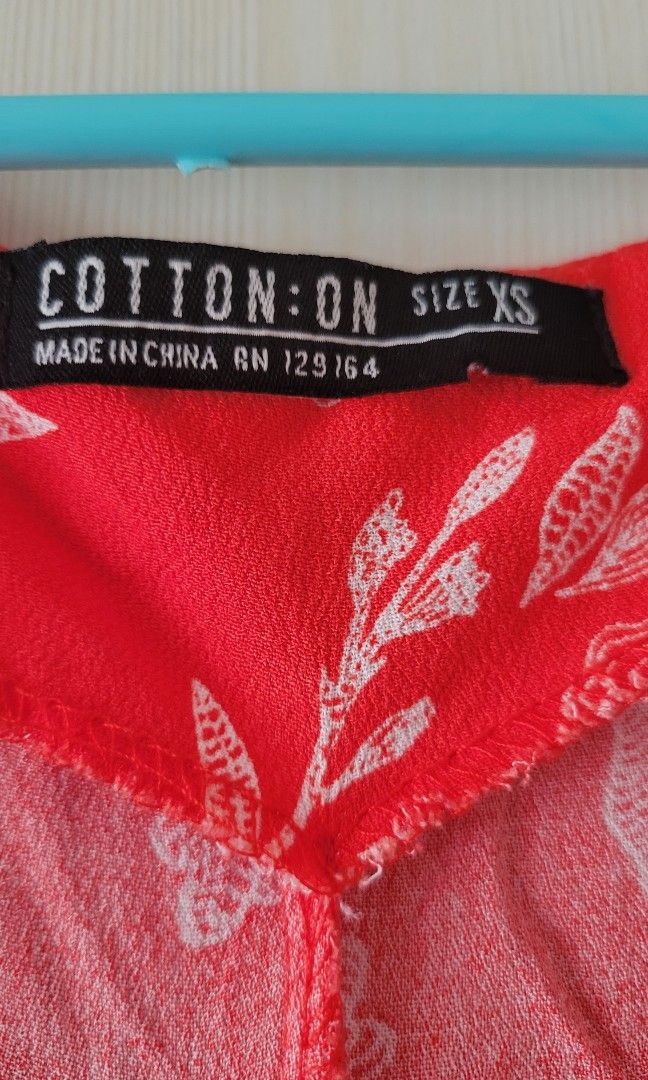 Red orange Cotton on floral romper (Category: Rompers) located in Cavite. Submitted by silvercarousel15 (Listing ID 1215682679, Image 3). Description: No flaws. Looks new just need ironing. 😅 I think it can upto small to semi Med (waistband is stretchable). Thru Lalamove and grab only..