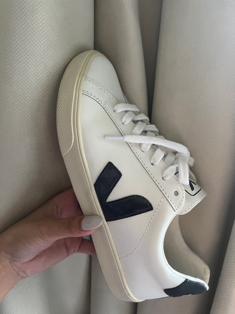 White sneakers with black v outlet