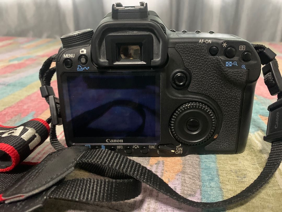 Canon EOS 50D (Category: Cameras) located in Quezon City. Submitted by hellogoodbri (Listing ID 1215875991, Image 3). Description: For Sale: Canon EOS 50D - Mint condition - Sold as pack: •comes with bag, batteries, battery charger, battery grip, external flash, usb cable - Lens model is EFS 18-55mm - Flash model is Canon Speedlite 430EX - Issue: plastic crack on the side (see last photo); does not affect function and performance. - Negotiable - 