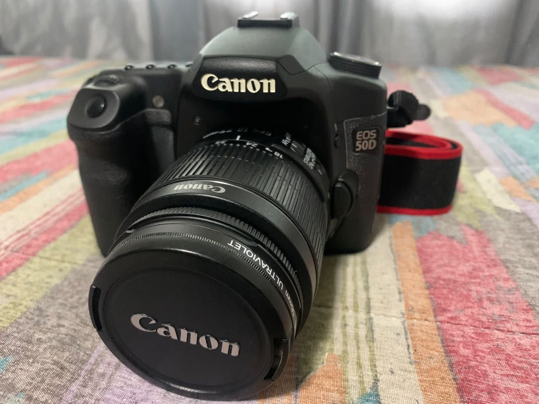 Canon EOS 50D (Category: Cameras) located in Quezon City. Submitted by hellogoodbri (Listing ID 1215875991, Image 2). Description: For Sale: Canon EOS 50D - Mint condition - Sold as pack: •comes with bag, batteries, battery charger, battery grip, external flash, usb cable - Lens model is EFS 18-55mm - Flash model is Canon Speedlite 430EX - Issue: plastic crack on the side (see last photo); does not affect function and performance. - Negotiable - 