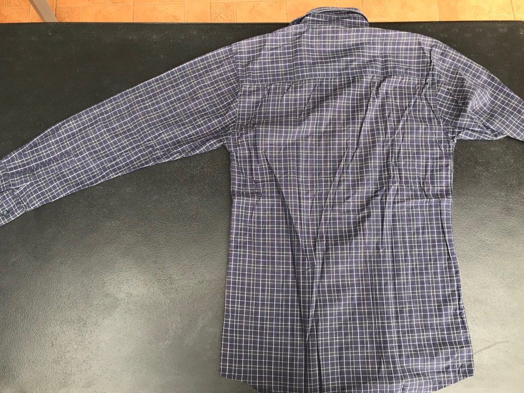 Crocodile Navy blue plaid long sleeve button up (Category: Formal Shirts) located in Puerto Princesa. Submitted by msirmoneyeah (Listing ID 1215955377, Image 3). Description: Crocodile Navy Blue Plaid longsleeve button up Preloved Clothes from my closet so please manage expectations 9/10 condition M size on tag Please refer to photos for tape measurements No visible issues.