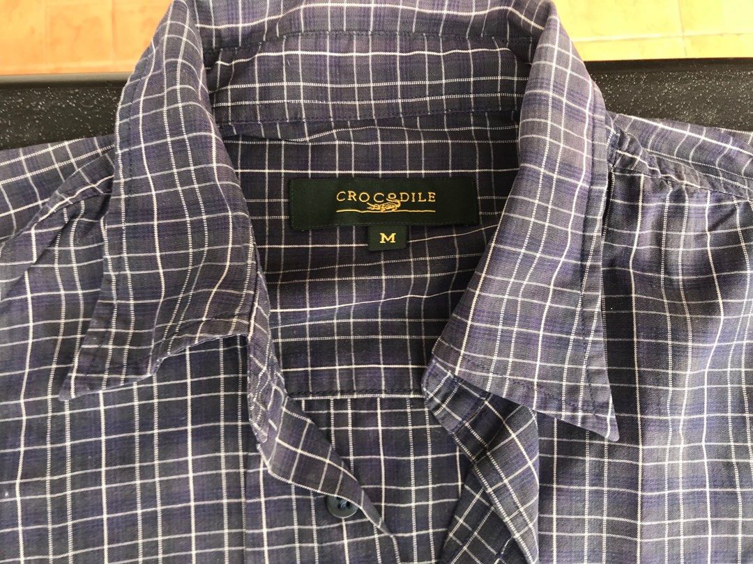 Crocodile Navy blue plaid long sleeve button up (Category: Formal Shirts) located in Puerto Princesa. Submitted by msirmoneyeah (Listing ID 1215955377, Image 1). Description: Crocodile Navy Blue Plaid longsleeve button up Preloved Clothes from my closet so please manage expectations 9/10 condition M size on tag Please refer to photos for tape measurements No visible issues.