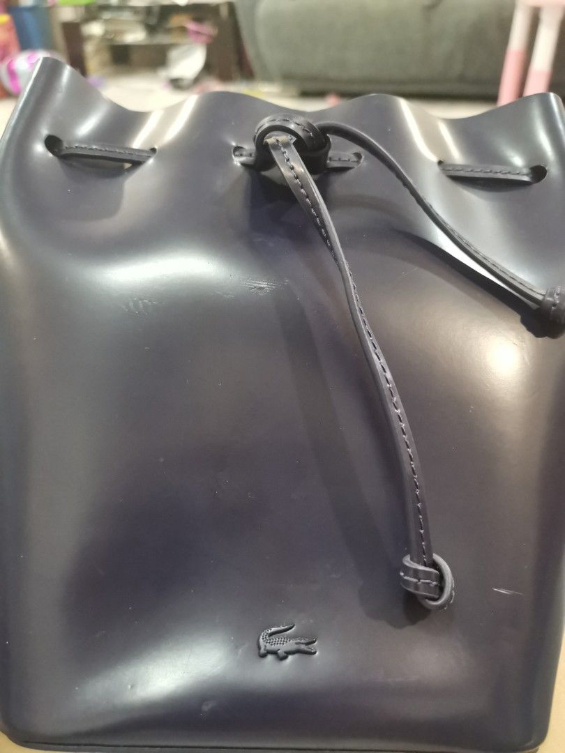 Lacoste Drawstring Bucket Bag, Luxury, Bags & Wallets on Carousell