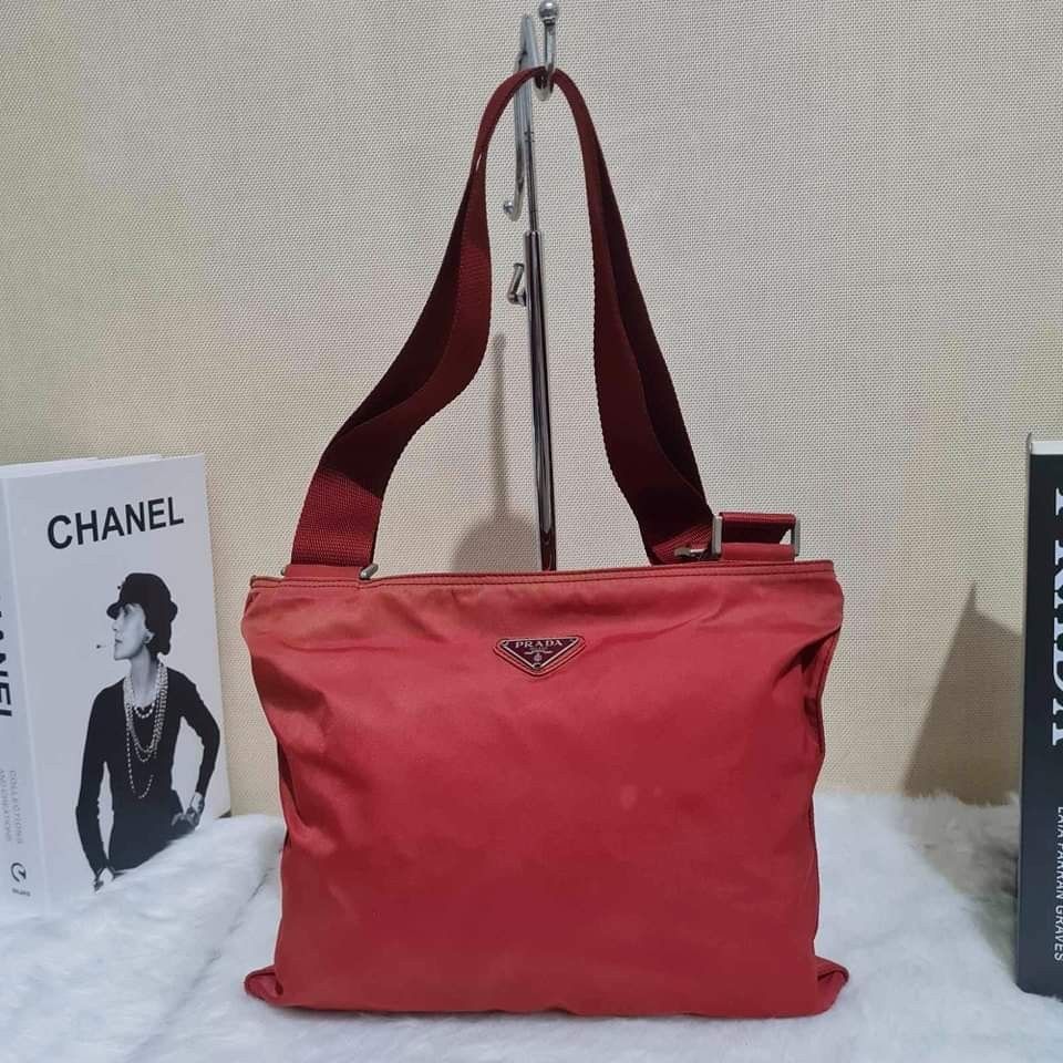 Prada Nylon Sling (Category: Luxury Bags & Wallets) located in Caloocan City. Submitted by lujosacollection (Listing ID 1215974843, Image 1). Description: 100%Authentic/Original Preloved Prada Nylon Sling Good condition No inclusion.