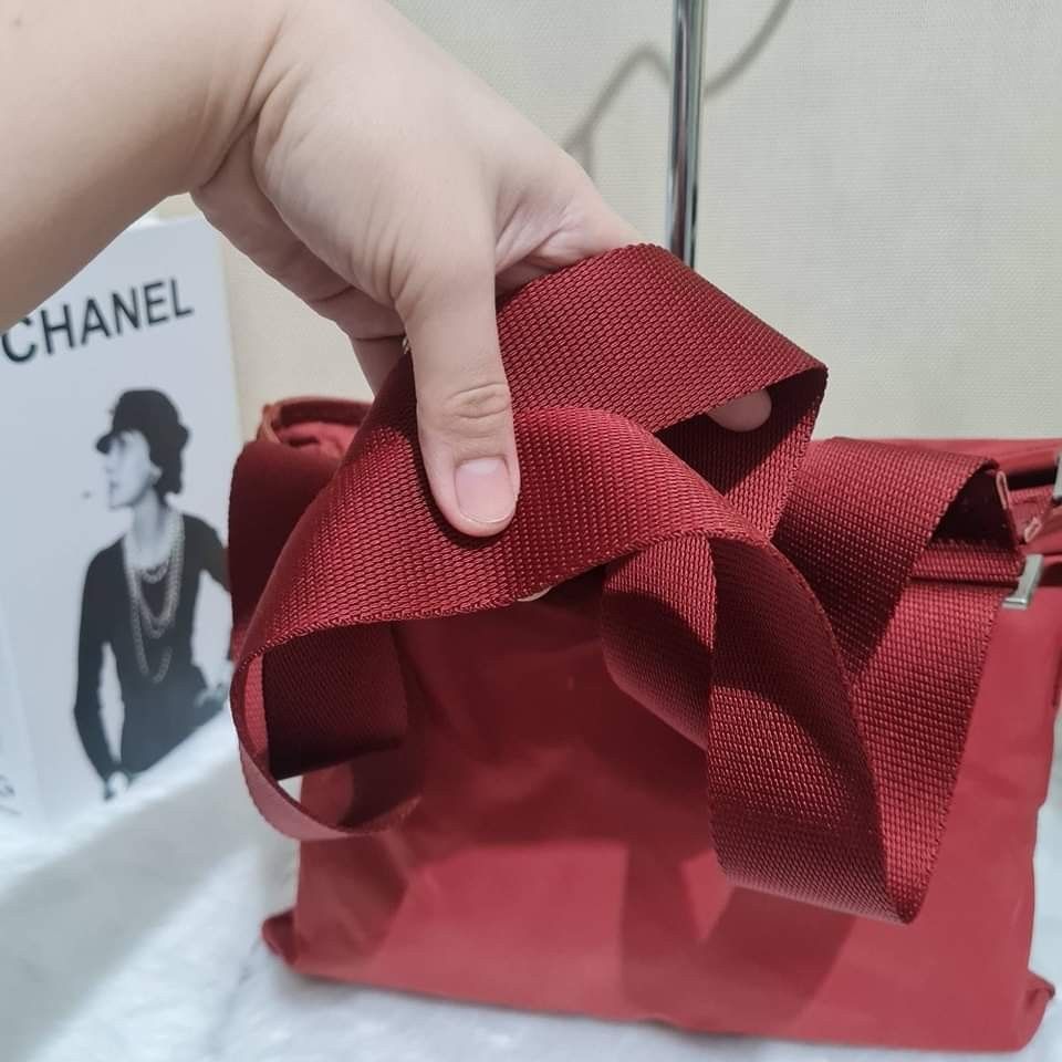 Prada Nylon Sling (Category: Luxury Bags & Wallets) located in Caloocan City. Submitted by lujosacollection (Listing ID 1215974843, Image 3). Description: 100%Authentic/Original Preloved Prada Nylon Sling Good condition No inclusion.