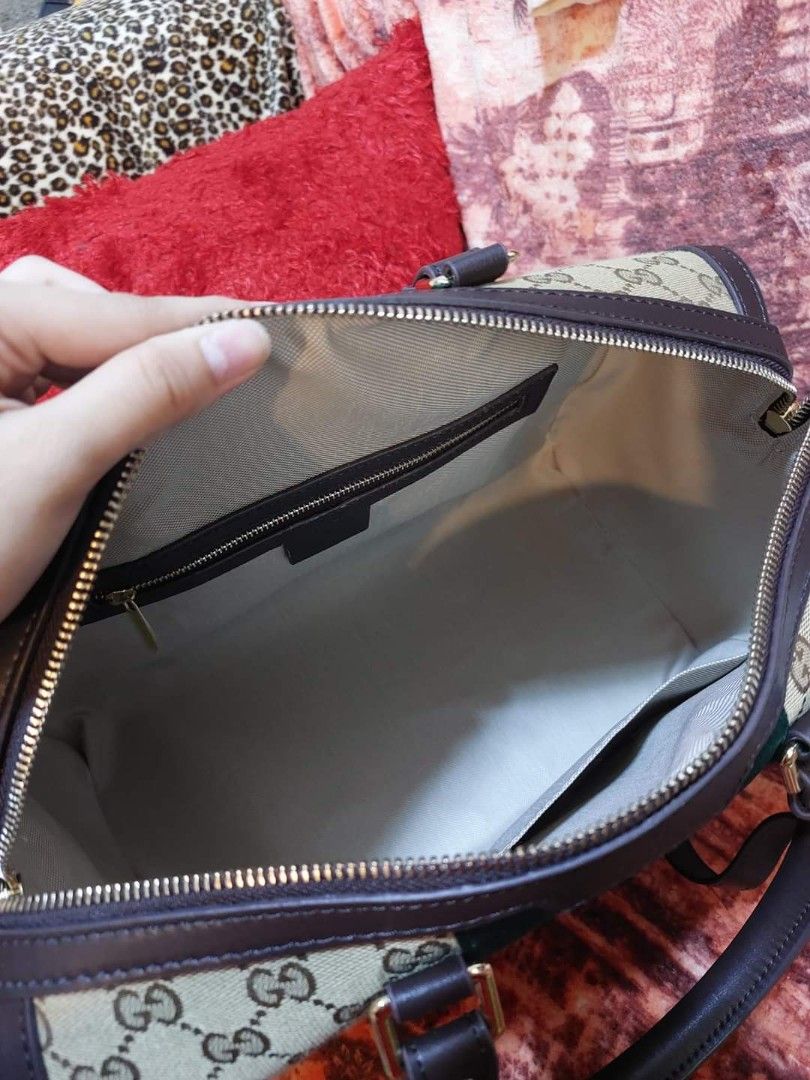 Preloved Gucci boston canvas 35cm (Category: Luxury Bags & Wallets) located in Cebu City. Submitted by day.98 (Listing ID 1216003399, Image 3). Description: selected from japan suplus canvas leather two way bag no flaws coded with dust bag.