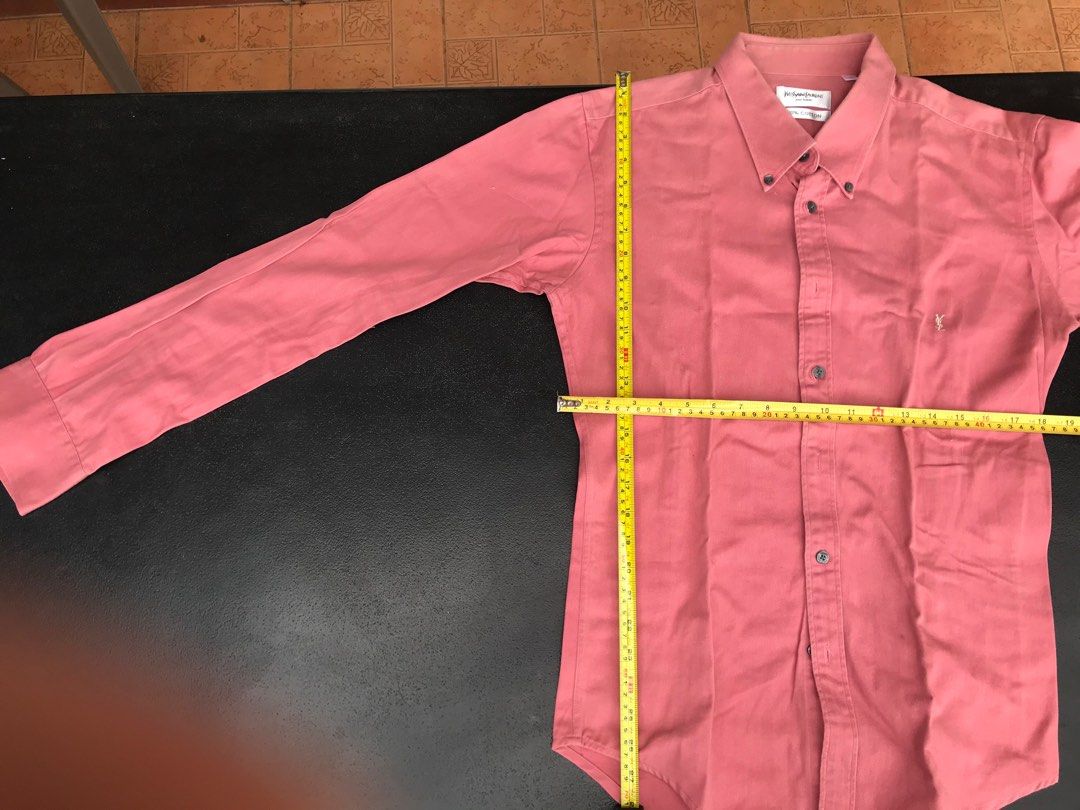 Yves Saint Laurent Wine colored button up shirt (Category: Formal Shirts) located in Puerto Princesa. Submitted by msirmoneyeah (Listing ID 1215946770, Image 3). Description: Yves Saint Laurent Wine colored long sleeve button up shirt Preloved Clothes from my closet so please manage expectations 8/10 condition XXL on tag but fits S-M Please refer to photos for tape measurements Slight signs of use, issues on image 7 and 8.