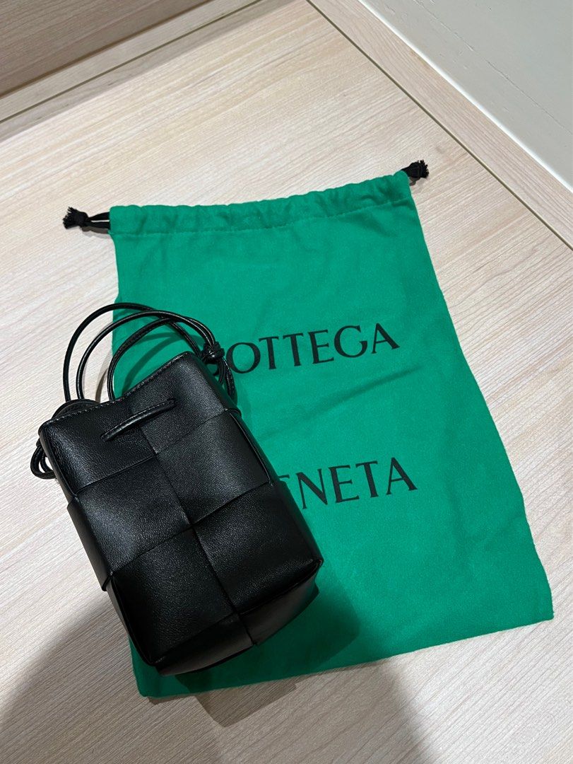 Bottega Veneta® Mini Cassette Bucket Bag in Parakeet. Shop online now.